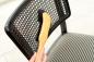 Preview: Polsterbürste aus Buchenholz mit schwarzem Rosshaar-Besatz reinigt Stuhl