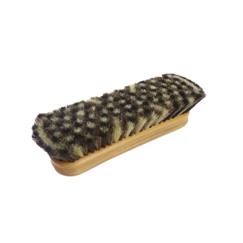 Eine Kleiderbürste "Zebra" umgedreht.